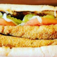 Catfish Po Boy · Served fried or grilled on fresh french bread, crispy lettuce, pickles, tomatoes, and house ...