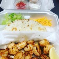 Shrimp Tacos · Build your own tacos with a 1/2lb of shrimp (fried or grilled), 3 flour shells, crisp lettuc...