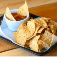 Chips & Salsa. · Our rich & spicy salsa served with tortilla chips