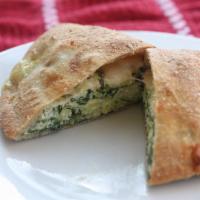 4 TOPPING VEGGIE TABLE CALZONE · 