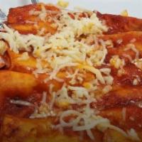 Red Enchiladas · 4 red  cheese enchiladas with rice, beans and salad.
