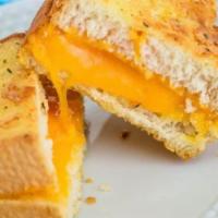 Grilled Cheese Sandwich · Cheddar and American cheese. 