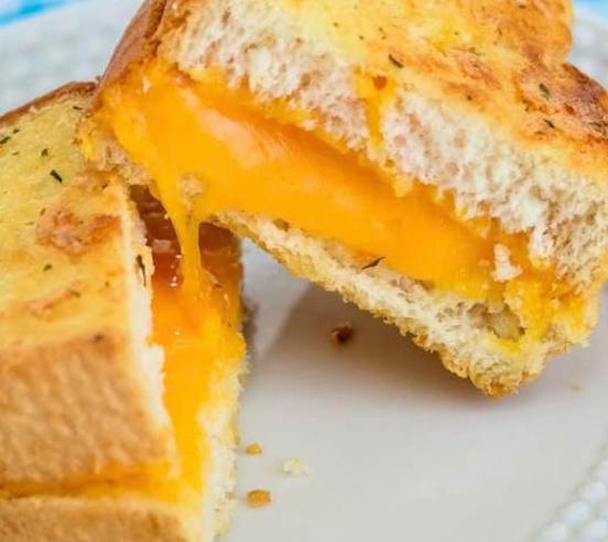 Grilled Cheese Sandwich · Cheddar and American cheese. 