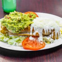 Chimichanga · A fried  and wrapped large flour tortilla filled with rice, beans, cheddar cheese and your c...