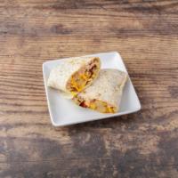 Breakfast Burrito · Two scrambled eggs, tomato, onions, home fries, cheese, and your choice of protein (Bacon/Ch...