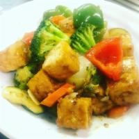 Tofu Supreme · Stir fried tofu with mixed vegetables of broccoli, bell pepper, zucchini, carrot and onion w...