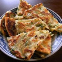 Scallion Pancake · 葱油饼. chinese crepe with green onions, 6-8 pieces