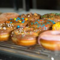 Assorted Mixed Donuts · An assortment of donuts including regular, cake, filled and twists. Includes only yeast.