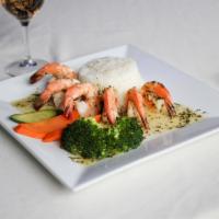 Camarones al Ajillo · Jumbo shrimp sauteed in garlic and olive oil served with seasonal assorted vegetables and wh...