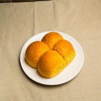 Corn Bread (4 Pack) · A Jamaican twist on a traditional roll. The corn bread combines golden corn meal into a ligh...