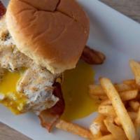 Breakfast Burger  · Beef Burger topped with cheese, bacon, and fried egg served on a toasted brioche bun