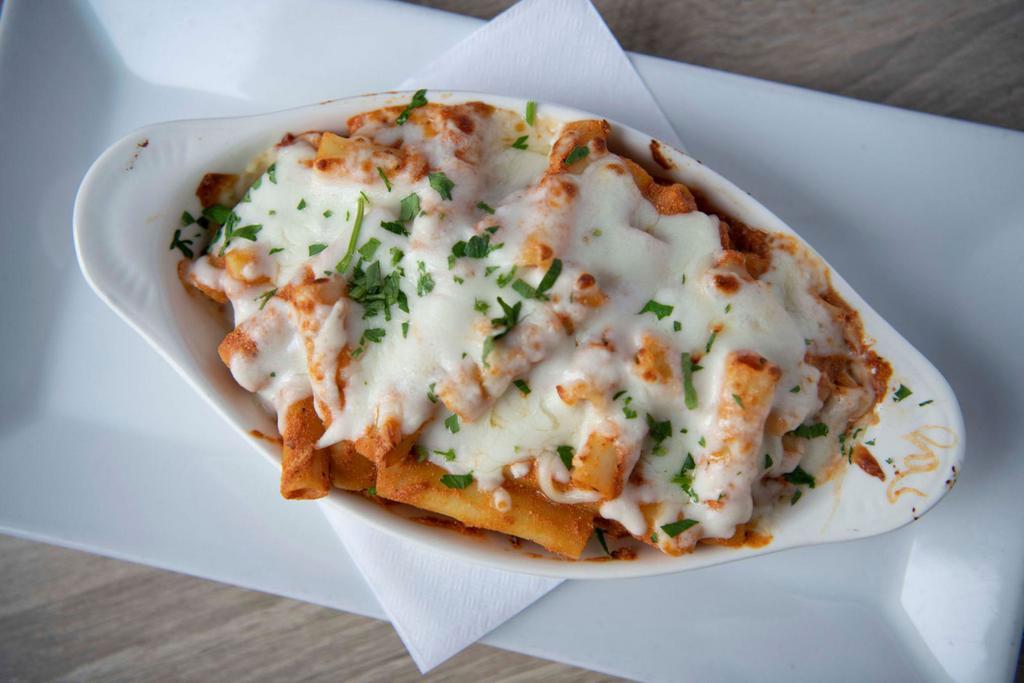 Baked Ziti (vegetarian) · Ziti tossed with our Chef’s homemade tomato sauce and ricotta cheese. Topped with Mozzarella.