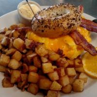 Egg Sandwich · Two eggs any style, bacon, cheddar. Toasted bagel, croissant, or english muffin. Served with...