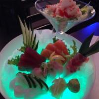 Sashimi Platter · 18 pieces of assorted raw fish with rice on the side. Served with soup or salad.