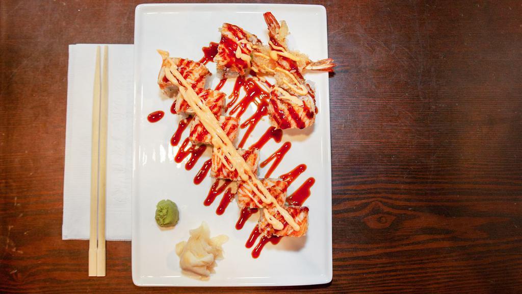 Yummy Roll · Shrimp tempura, avocado. Top: spicy kani, eel sauce and spicy mayo. 