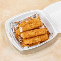 Fried Mozzarella Sticks · Mozzarella cheese that has been coated and fried.