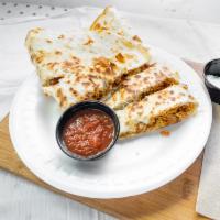 Quesadillas · Cooked tortilla that is filled with cheese and folded in half. 