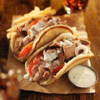 41. Beef and Lamb Gyro Sandwich · Cooked on a spit and wrapped in a pita.