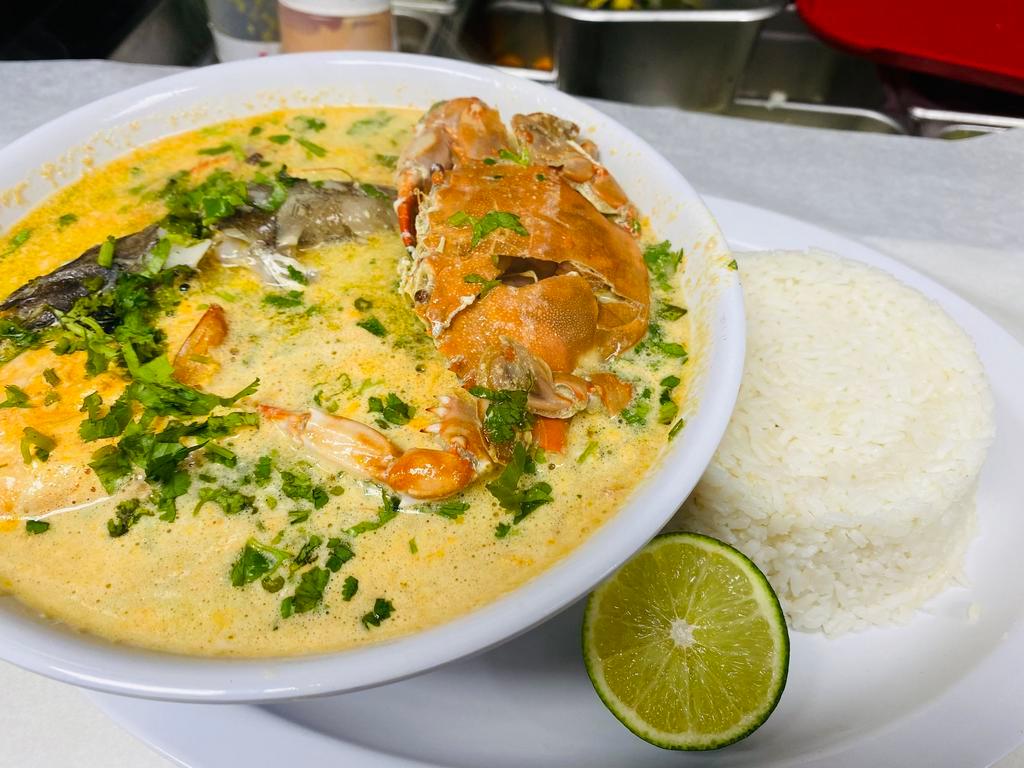 Seafood soup    sopa de mariscos · Calamari, clams,fish,shrimp,tuna