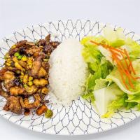 Kung Pao Chicken · Stir-fried chicken with onions, carrots, celery and peanuts.