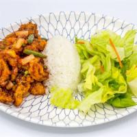 Sweet and Sour Pork · Deep-fried pork sauteed in sweet and sour sauce with onions and carrots.