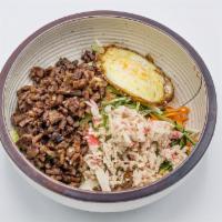 Bibimbap · Fresh vegetables over rice, served with chopped steak and a fried egg. Mix with spicy red sa...