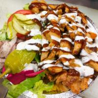 Chicken Shawarma Medium Bowl · Thinly sliced, flame roasted chicken. Served with rice, salad (lettuce, pickles, turnip, bee...