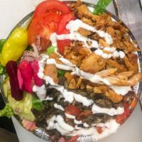 Mixed Shawarma Medium Bowl · Thinly sliced, flame roasted chicken and lamb & beef shawarma. Served with rice, salad (lett...