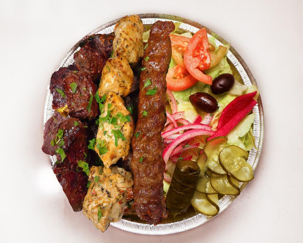 Mix Grill Platter · A taste of three platter entrees. Served with rice, salad (lettuce, pickles, turnip, beets, onions), 3 side sauces and pita. 