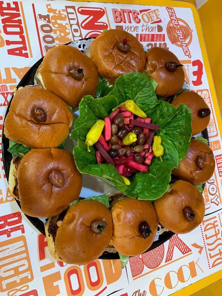 Cheeseburger Tray · Includes 10 cheeseburgers with grilled onions, American cheese, lettuce, tomato, pickles and special house sauce in a brioche bun.