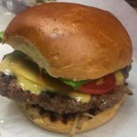Cheese Burger · Cheese burger ( Marinated with herb) grilled onions, American cheese, lettuce, tomato, pickl...