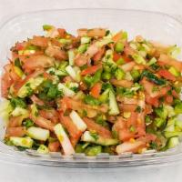 Cucumber Tomato Salad · Tomatoes, cucumber, green peppers and parsley with house dressing