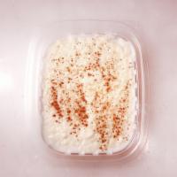 Rice Pudding · Homemade rice pudding cooked with milk and cinnamon.