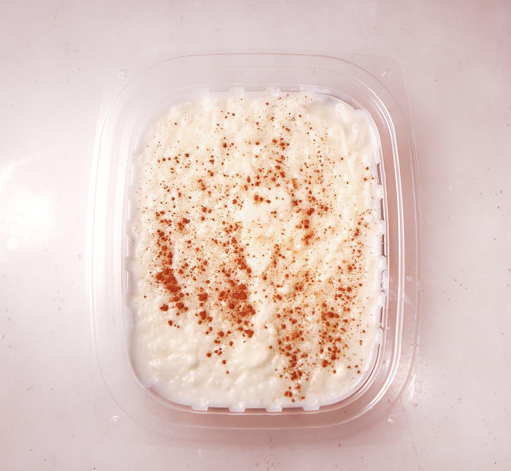 Rice Pudding · Homemade rice pudding cooked with milk and cinnamon.