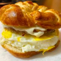 Breakfast Sandwich · Egg and cheese on a toasted bagel of your choice.