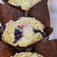 Jumbo Muffins · Assorted variety of fluffy house-made muffins. 