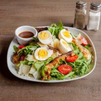 Eggplant and Arugula Salad · 2 boiled eggs, tomatoes, shaved Parmesan cheese, sunflower seeds and balsamic vinaigrette. A...
