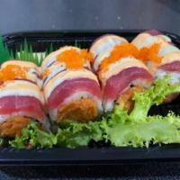 Red Dragon Roll · Spicy crunchy tuna, avocado, topped with sliced tuna with spicy mayo, honey wasabi and cavia...
