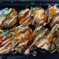 Crush Roll · Eight jumbo pieces. Spicy tuna, salmon, white fish and avocado, deep fried, top with eel sau...