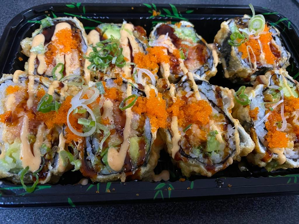 Volcano Special Roll · Six jumbo pieces. Spicy tuna, kani, avocado, deep fried, spicy mayo and eel sauce, scallion and masago. 