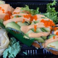 Rocky I Roll · Spicy crunchy tuna topped with sliced avocado, spicy mayo and masago. 