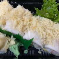Snow Flake Roll · Shrimp, kani, cucumber, avocado, top white tuna and tempura flake. 