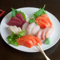Sashimi Deluxe Entree · Assorted 18 pieces of sashimi. Served with miso soup or salad. 