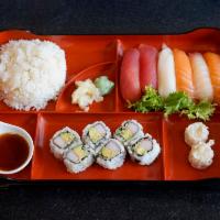 Dinner Sushi Bento Box · Six pieces sushi and one California roll. Served with miso soup or salad, dumpling and rice. 