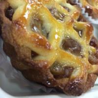 Apple Tart · Cookie dough tart with a real apple filling that is caramelized with cinnamon.