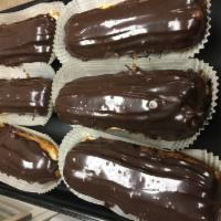 Large Eclairs · Oblong pastry with a custard filling. Frosted with chocolate.