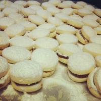 Alfajores  · Alfajores with a dulce de leche filling and covered with powdered sugar.
