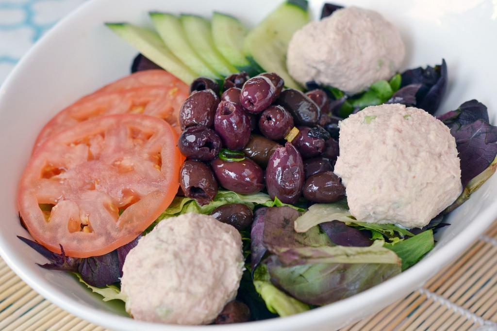 Tuna Salad · Mesdun greens, tomatoes, and cucumbers. Topped with tuna balls and lite lemon dressing.
