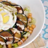 Sabich Salad · Lettuce, tomatoes, cucumbers, hard-boiled egg, eggplant and tahini.