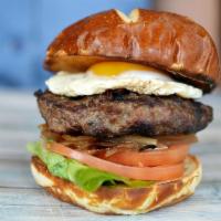 P.G.B. Burger · Sunny-side up egg, grilled onions, tomato, lettuce and our special sauce. Our 100% fresh (ne...